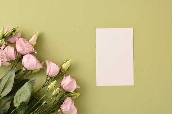 Pink Flowers and Piece of Paper